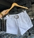 Shorts jeans branco com cinto - comprar online