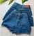 Shorts jeans com brilho na frente na internet