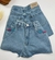 Shorts jeans com crochê no bolso - comprar online