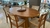 Mesa de Jantar Oval com Base Pedestal em Madeira Imbuia - comprar online
