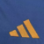 Camisa da AS Roma 24/25 da Adidas na cor azul com detalhes em vermelho e amarelo.