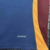 Camisa da AS Roma 24/25 da Adidas na cor azul com detalhes em vermelho e amarelo.