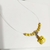 Choker feminina ponto de luz amarelo pingente de joaninha - comprar online