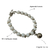 Pulseira Branca Pingente Metal - VOCÊ PODE Bijuterias