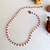 Imagem do Gargantilha branca vermelha Choker de miçangas