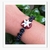 Imagem do Pulseira Macramê Preta Pingente Flor