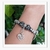Pulseira Feminina Prateada Pingentes - loja online