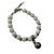 Imagem do Pulseira Branca Pingente Metal