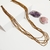 colar longo feminino canutilho dourado claro - comprar online