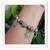 Pulseira Feminina Prateada com Pingentes - loja online