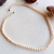 Choker gargantilha branca laranja unissex - loja online