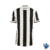 Camiseta de futebol Botafogo para torcedores, com listras pretas e brancas e escudo do clube.