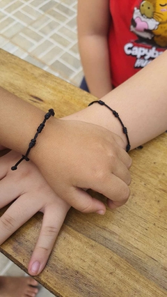 Pulseira 7 Nós Preta - Força e Poder - comprar online