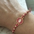 Pulseira olho grego rosa