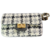 Bolsa Malhada Italiana Jeane Steiner em tecido xadrez preto e branco com fecho dourado.