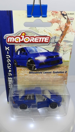 Miniatura Mitusbishi Lancer Evolution 9 Majorette Abre porta na internet