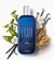 Frasco da colônia Egeo Feminina 90ml com fundo de flores e especiarias.