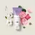 Antitranspirante em creme O Boticário Cuide-se Bem Rosa e Algodão em tubo, cercado por flores de rosa e algodão.