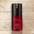 Frasco do desodorante masculino Natura Essencial Supreme com tampa preta e corpo vermelho.