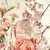 Frasco de perfume Colônia Floratta Variedades 75ml entre flores rosa e brancas.