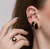 Piercing fake gotinha ônix na internet