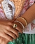 Bracelete Lívia Ouro na internet