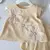 Conjunto infantil três flores Bella - comprar online