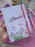 Planner agenda não datado com capa decorada por flores e borboletas.