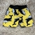 Short amarelo estampado