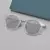Óculos de sol polarizados redondos em acetato e titânio, com frete grátis. Óculos de sol feminino e masculino com estilo, unindo proteção polarizado a um design redondo sofisticado em acetato e titânio.