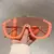 Óculos de sol máscara em acetato e metal, com frete grátis. Óculos de sol feminino escuro com estilo oversize, combinando design marcante em acetato e metal para um visual único e sofisticado.