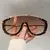 Óculos de sol máscara em acetato e metal, com frete grátis. Óculos de sol feminino escuro com estilo oversize, combinando design marcante em acetato e metal para um visual único e sofisticado.