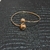 PULSEIRA BRACELETE COM 2 BOLAS