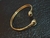 BRACELETE BOLAS NAS PONTAS