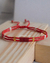 SET DE PULSERAS CORAZÓN ROJO & CREMA en internet