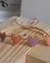 SET DE PULSERAS CORAZÓN VIOLETA & ROSA en internet