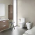 Inodoro Largo Deposito Tapa Amortiguada + Bidet The Gap Roca