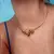CHOCKER RIGIDA TRÊS GOTAS