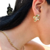 Aretes Petalos Dorados en internet