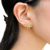 Aretes de moño textura cordón en internet
