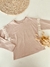 Remera rosa con puntilla