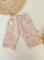 Pantalon bosque frisado con puntilla