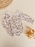 Body floreado con broderie