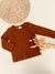 Remera bolsillo terracota