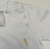 Body Branco Detalhe Aplicado Páscoa Coelho Azul com Gravata fixa Novo - comprar online