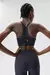 Top Feminino ideal para treinos de alto impacto, fecho reforçado para melhor ajuste