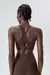 Top Feminino ideal para treinos de alto impacto, fecho reforçado para melhor ajuste