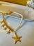 Imagem do Colar de pérolas e correntaria com estrelas folheado a ouro 18k