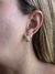 Argola P cravejada em zirconias folheado a ouro 18k