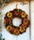Handmade door wreath with pine cone flowers